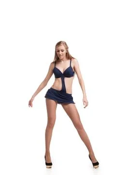 Young beautiful dancer posing on studio background Foto stock