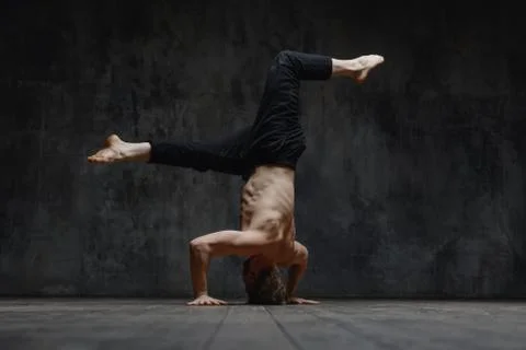 Young beautiful dancer is posing in studio Stock Photos