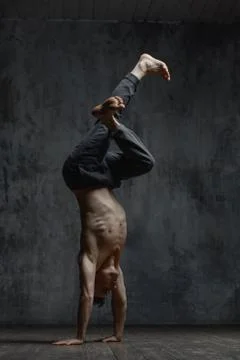 Young beautiful dancer is posing in studio Stock Photos