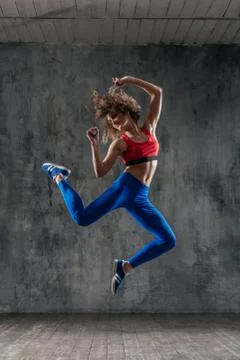 Young beautiful dancer is posing in studio Foto stock