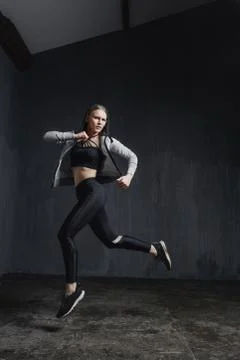 Young beautiful dancer is posing in studio Stock-Fotos