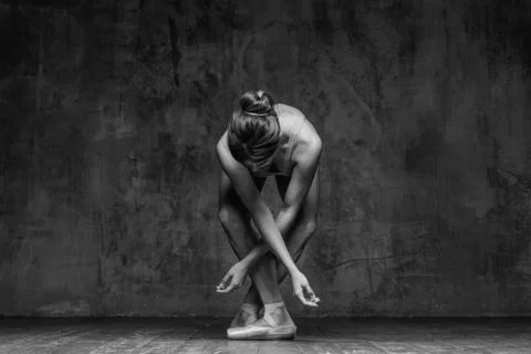 Young beautiful dancer is posing in studio Stock Photos