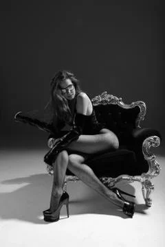 Young beautiful dancer is posing in studio Stock-Fotos