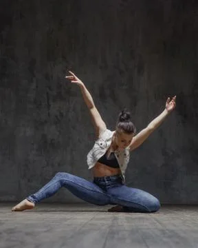 Young beautiful dancer is posing in studio Stock Photos