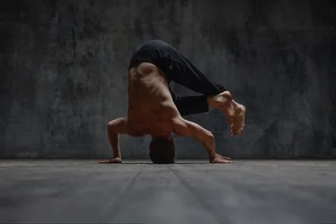 Young beautiful dancer is posing in studio Stock Photos