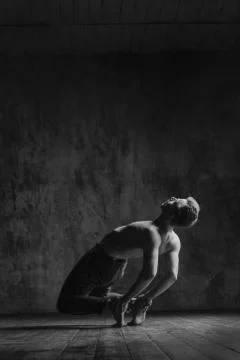 Young beautiful dancer is posing in studio Stock Photos