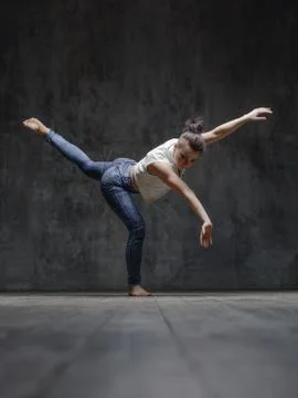 Young beautiful dancer is posing in studio Stock Photos