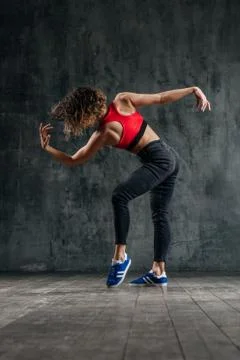 Young beautiful dancer is posing in studio Stock Photos