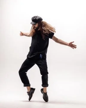 Young beautiful dancer posing in the studio Stock Photos