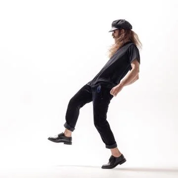 Young beautiful dancer posing in the studio Stock Photos