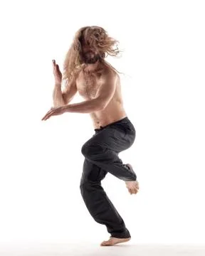 Young beautiful dancer posing in the studio Stock Photos