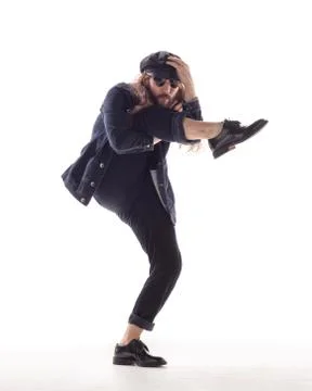 Young beautiful dancer posing in the studio Stock Photos