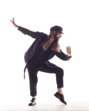 Young beautiful dancer is posing in studio Stock Photos