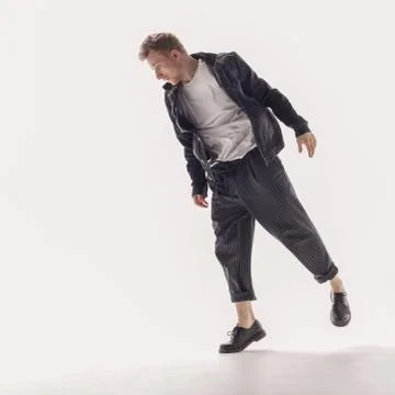 Young beautiful dancer posing in the studio Stock Photos