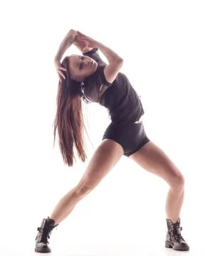 Young beautiful dancer is posing in studio Stock Photos