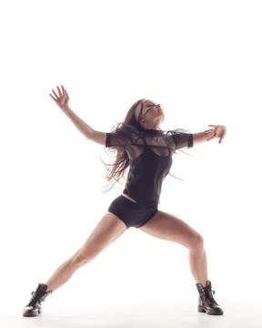 Young beautiful dancer is posing in studio Foto stock