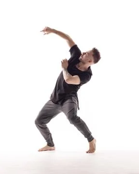 Young beautiful dancer is posing in studio Stock Photos