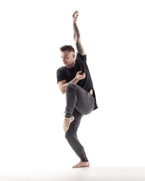 Young beautiful dancer is posing in studio Stock Photos