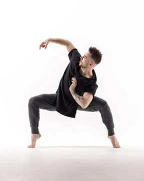 Young beautiful dancer is posing in studio Foto stock