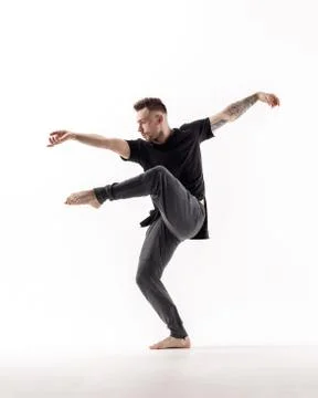 Young beautiful dancer is posing in studio Stock Photos