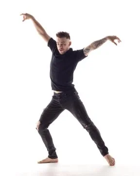 Young beautiful dancer is posing in studio Stock Photos