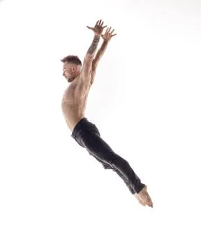 Young beautiful dancer is posing in studio Stock-Fotos