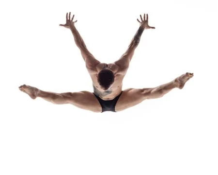 Young beautiful dancer is posing in studio Stock-Fotos