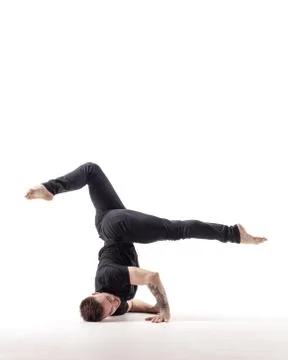 Young beautiful dancer is posing in studio Stock Photos