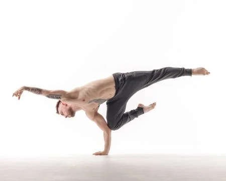 Young beautiful dancer is posing in studio Stock Photos