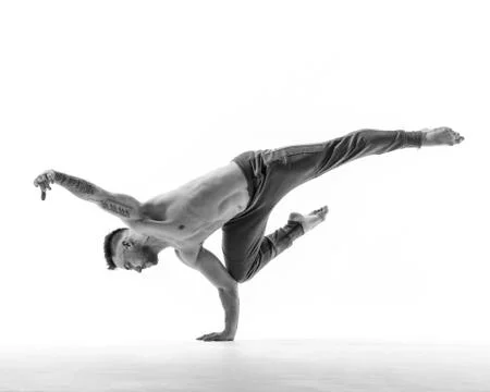 Young beautiful dancer is posing in studio Stock Photos