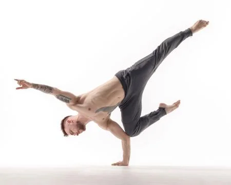 Young beautiful dancer is posing in studio Stock-Fotos