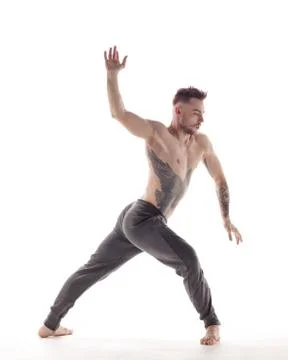 Young beautiful dancer is posing in studio Stock Photos