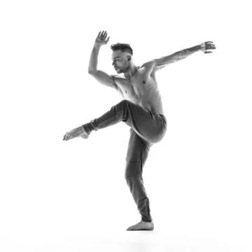 Young beautiful dancer is posing in studio Stock Photos