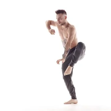 Young beautiful dancer is posing in studio Stock Photos