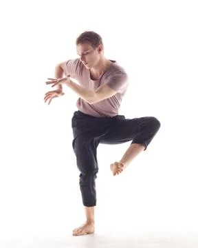 Young beautiful dancer is posing in studio Stock-Fotos