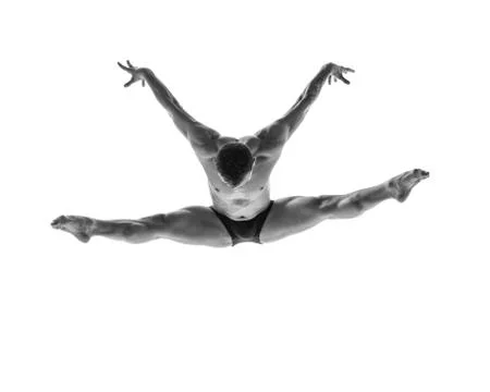 Young beautiful dancer is posing in studio Stock Photos