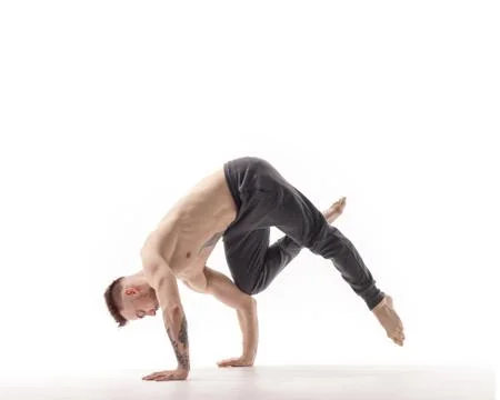 Young beautiful dancer is posing in studio Stock-Fotos