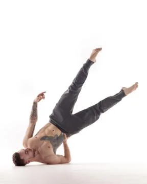 Young beautiful dancer is posing in studio Stock Photos