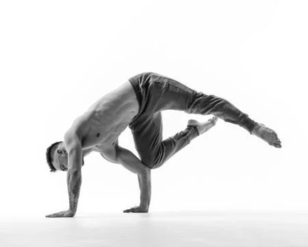 Young beautiful dancer is posing in studio Stock Photos