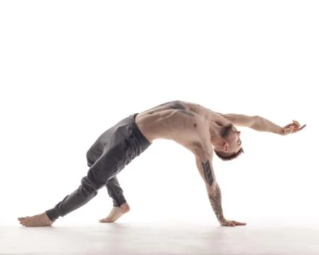 Young beautiful dancer is posing in studio Stock Photos