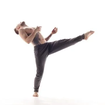 Young beautiful dancer is posing in studio Stock Photos