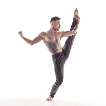 Young beautiful dancer is posing in studio Stock-Fotos