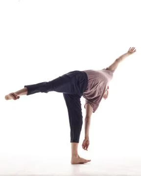 Young beautiful dancer is posing in studio Stock Photos