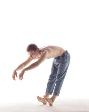 Young beautiful dancer is posing in studio Stock Photos