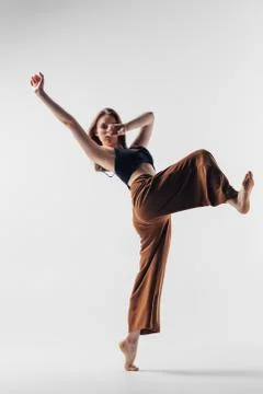 Young beautiful dancer posing in studio Stock Photos