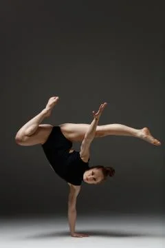 Young beautiful dancer is posing in studio Foto stock