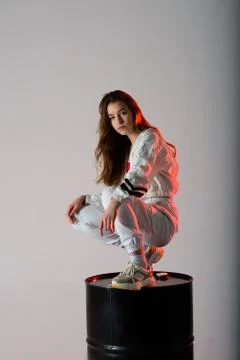 Young beautiful dancer posing on a studio background Stock Photos