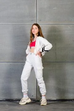 Young beautiful dancer posing on a studio background Stock Photos