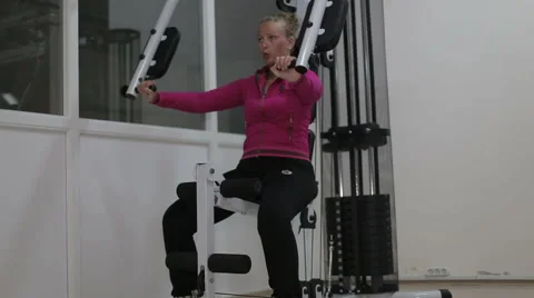The young beautiful girl engaged in active sports in the gym Stock Footage 63661545