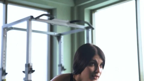 Young beautiful girl in the gym. Stock Footage 89610053